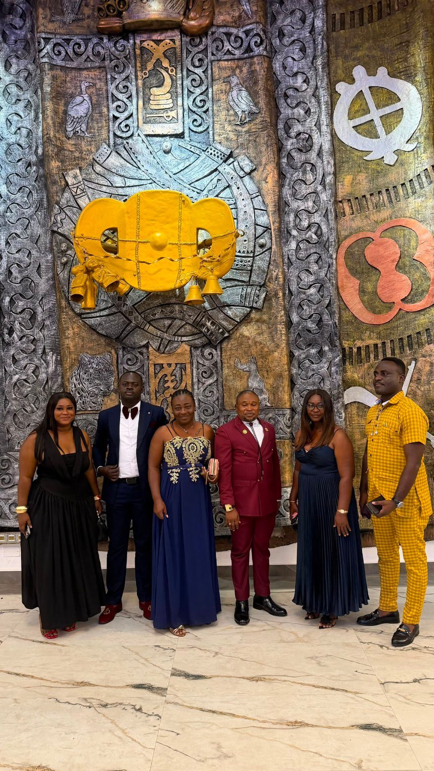 Group photograph at a formal cultural venue